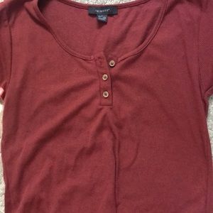 maroon top with three buttons